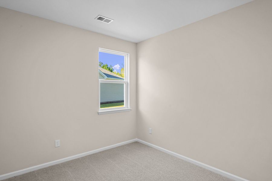 Spacious, unfurnished interior of a new home in Heritage Park at Longs, Longs (Image 19).