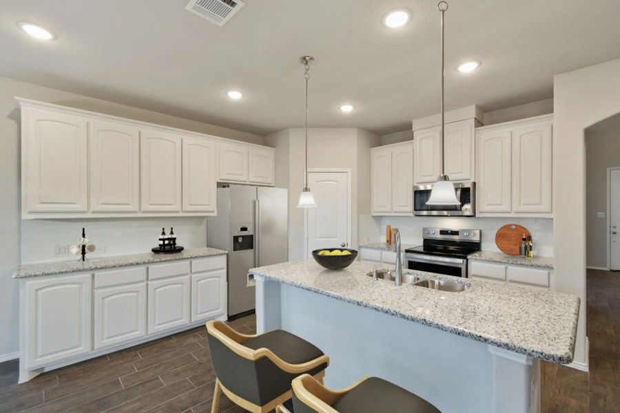 Kitchen | Concept 2844 at Hunters Ridge in Crowley, TX by Landsea Homes