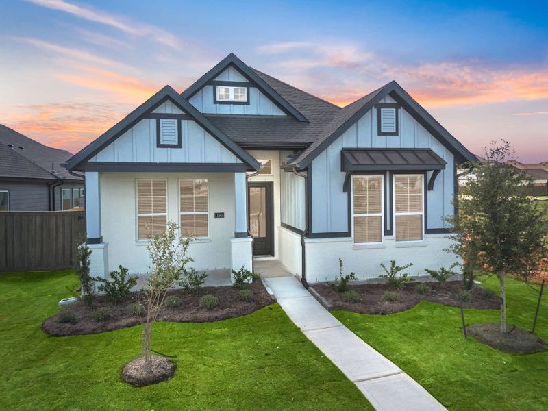 Front exterior of a new home in Riceland, Mont Belvieu, TX, highlighting curb appeal (Image 19). Front exterior of a new home in Riceland, Mont Belvieu, TX, highlighting curb appeal (Image 19).