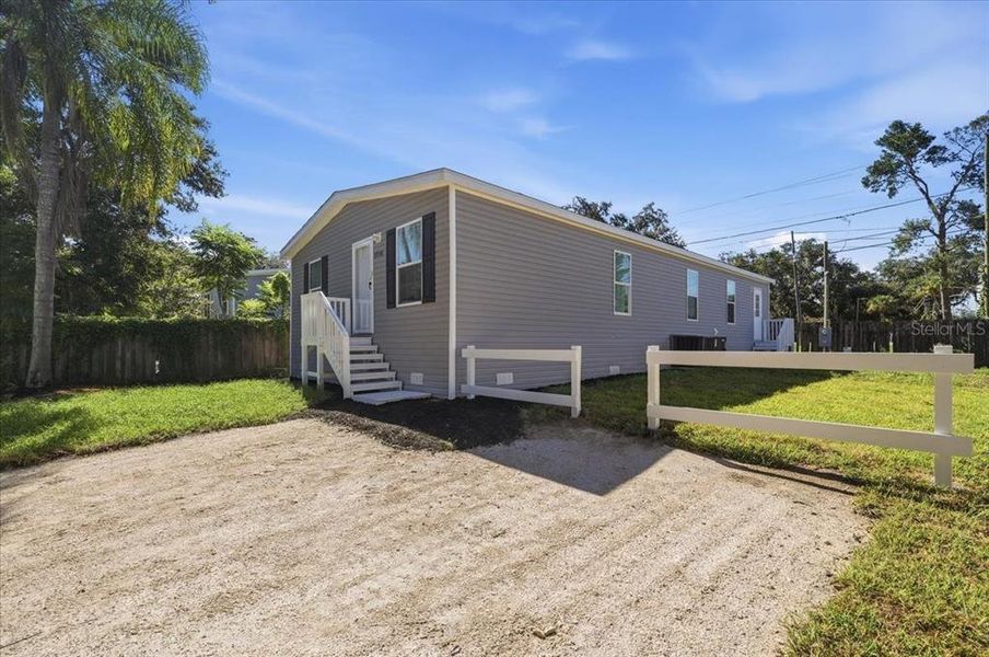 Exterior details and patio area of a home in , Zephyrhills (Image 22).