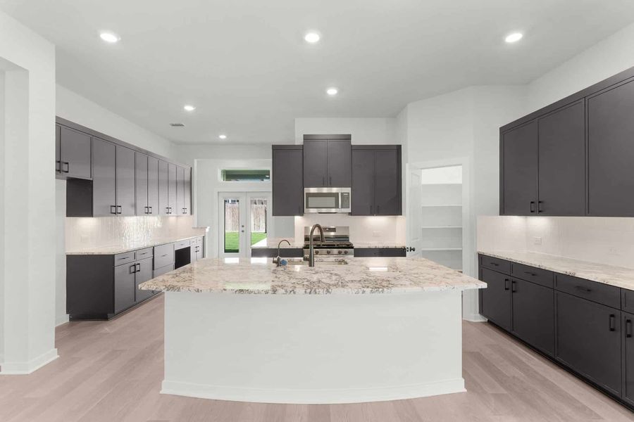 Representative furnished interior of a home built from the Julia by Chesmar Homes in Nolina, Georgetown (Image 3).