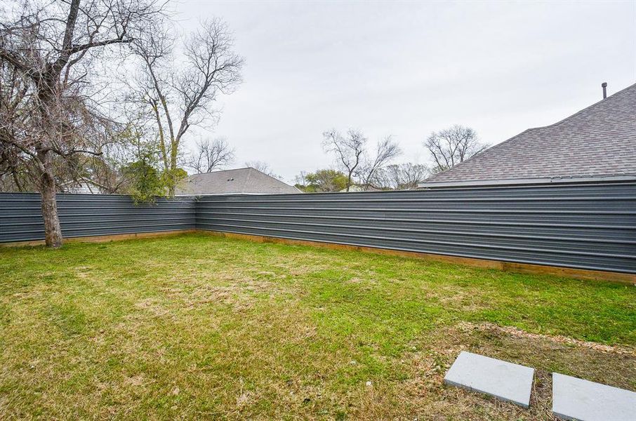 Your entire back property is fenced in for added privacy, security and comfort --- especially when entertaining outdoors!