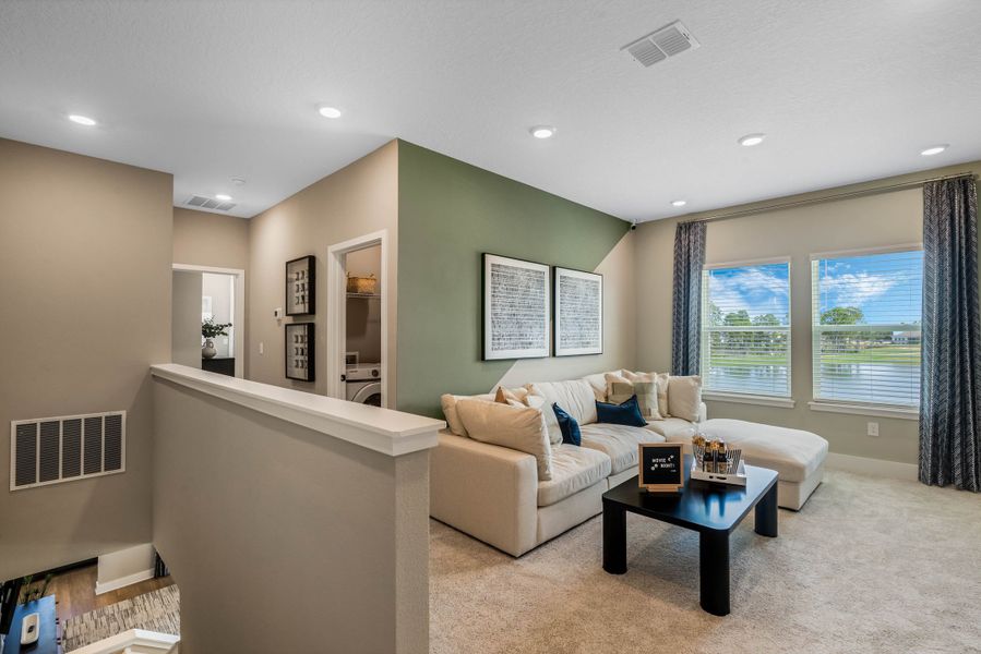 Furnished interior view inside a new home in Harvest at Ovation - Townhomes, Winter Garden (Image 32).