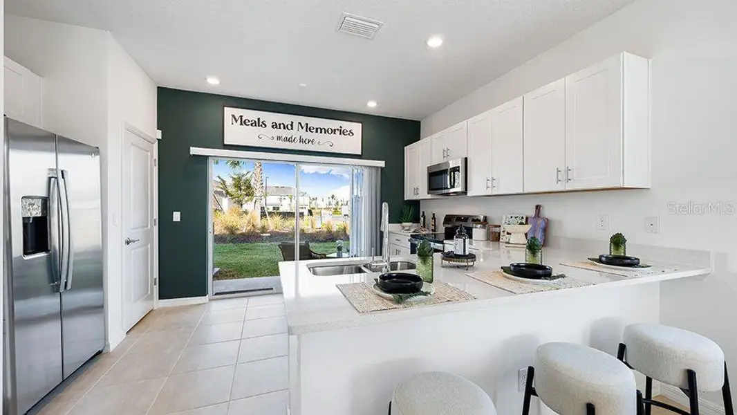 Furnished interior view inside a new home in The Townhomes at Azario Lakewood Ranch, Bradenton (Image 5).