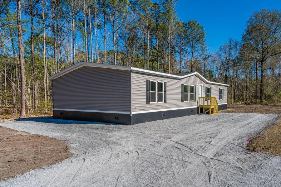 Exterior details and patio area of a home in , Summerville (Image 19).
