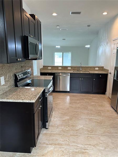 Furnished interior view inside a new home in , Deltona (Image 7). Furnished interior view inside a new home in , Deltona (Image 7).