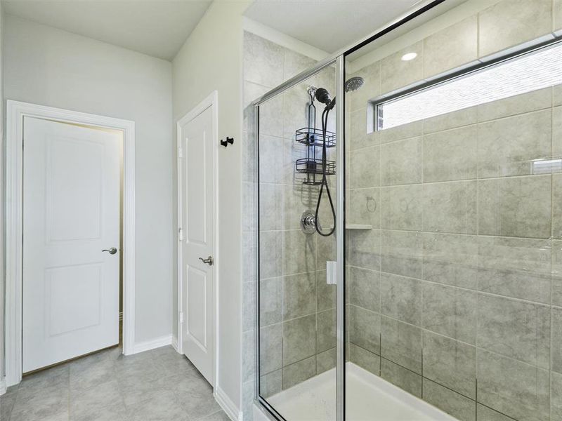 Bathroom featuring an enclosed shower