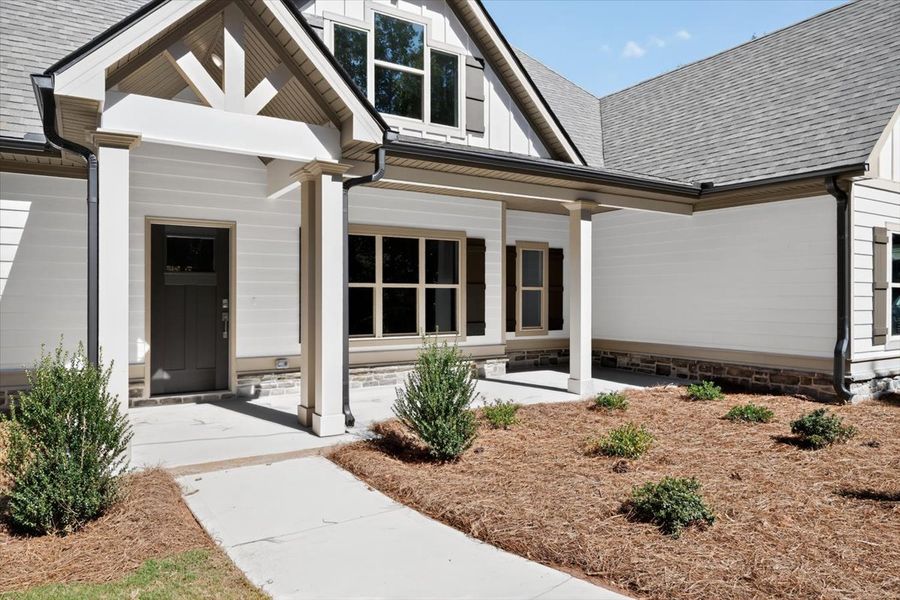 Exterior details and patio area of a home in White Oaks, The Rock (Image 24).
