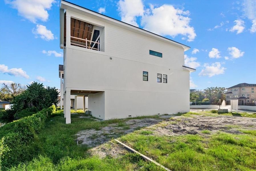 Exterior details and patio area of a home in , Sarasota (Image 19).
