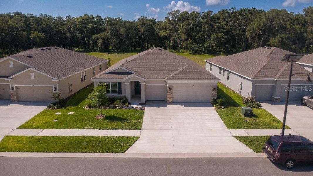 Front exterior of a new home in , Wildwood, FL, highlighting curb appeal (Image 23). Front exterior of a new home in , Wildwood, FL, highlighting curb appeal (Image 23).