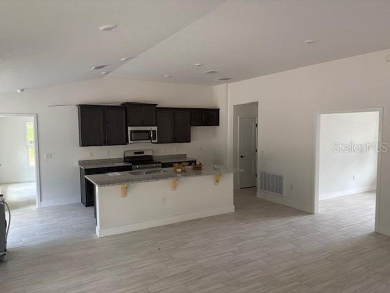 Furnished interior view inside a new home in , Dunnellon (Image 4).