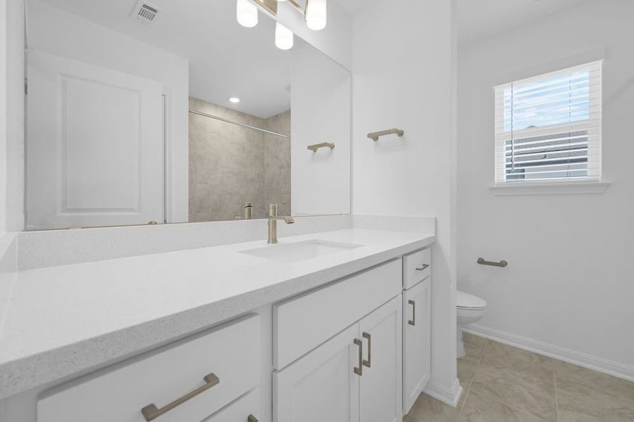 Furnished interior view inside a new home in Travisso Capri Collection, Leander (Image 8).