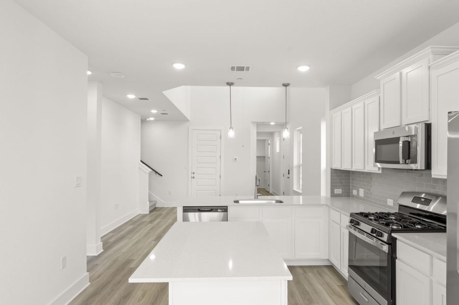 Furnished interior view inside a new home in Center 45, Round Rock (Image 4).