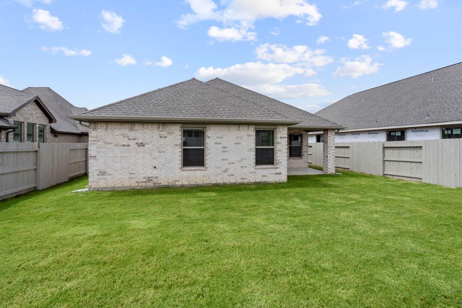Front exterior of a new home in Pomona 50' & 55', Manvel, TX, highlighting curb appeal (Image 14). Front exterior of a new home in Pomona 50' & 55', Manvel, TX, highlighting curb appeal (Image 14).