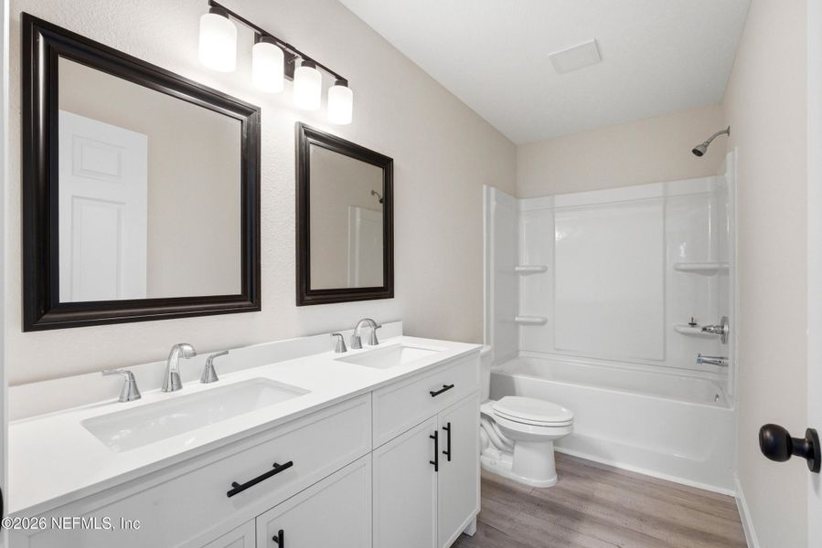 Furnished interior view inside a new home in , Jacksonville (Image 11). Furnished interior view inside a new home in , Jacksonville (Image 11).
