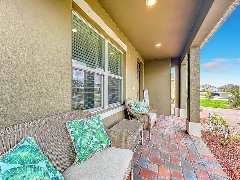 Exterior details and patio area of a home in Cypress Bay West, Palm Bay (Image 27).
