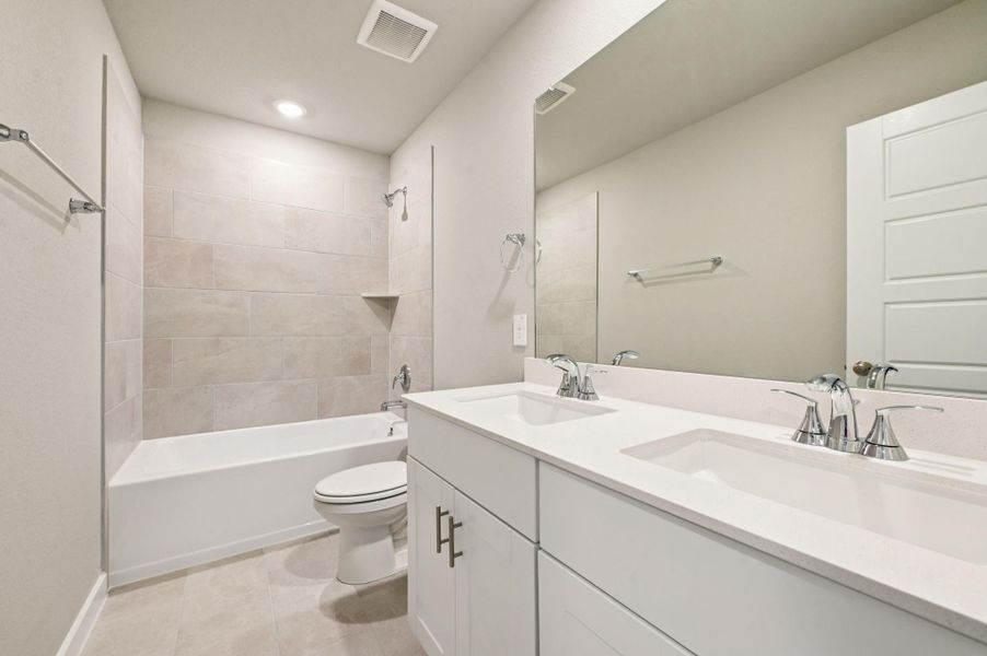 Furnished interior view inside a new home in Heights of Barbers Hill, Mont Belvieu (Image 5).