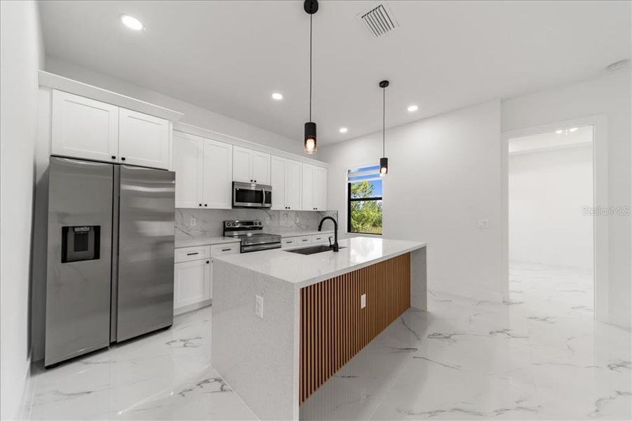 Furnished interior view inside a new home in , Cape Coral (Image 8).
