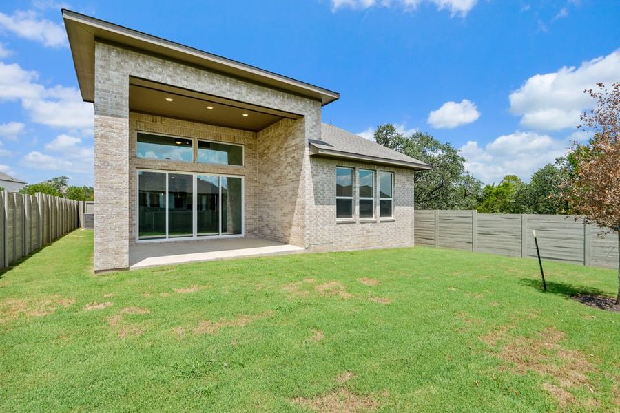 Front exterior of a new home in Arbor Collection At Wolf Ranch, Georgetown, TX, highlighting curb appeal (Image 22).
