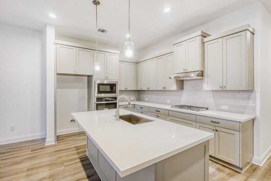 Furnished interior view inside a new home in 6 Creeks, Kyle (Image 4).