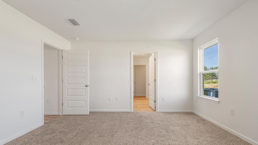 Spacious, unfurnished interior of a new home in Ashton Park Phase III, Freeport (Image 18).