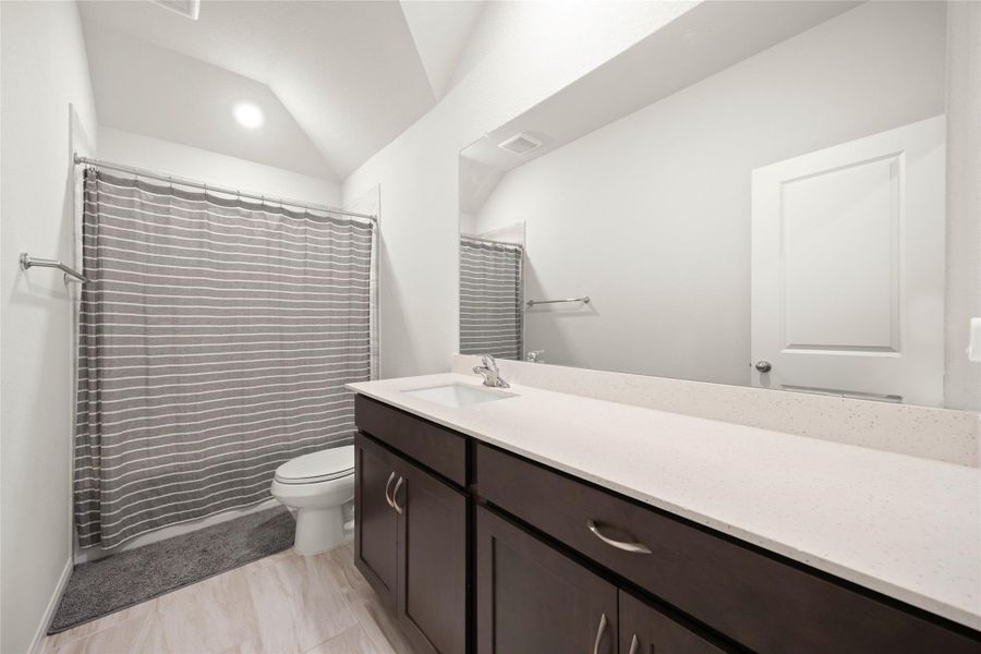 The full bathroom features a convenient tub and shower combination. The full bathroom features a convenient tub and shower combination.