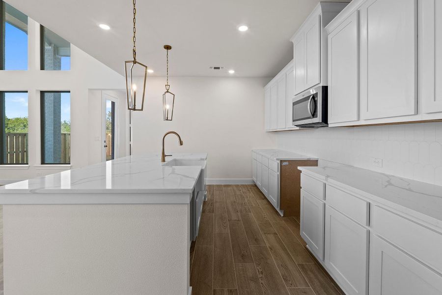 Furnished interior view inside a new home in Parmer Ranch, Georgetown (Image 8).