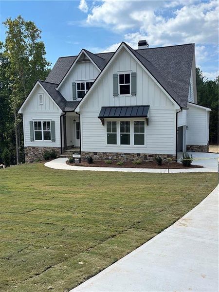 Front exterior of a new home in , Waleska, GA, highlighting curb appeal (Image 6).