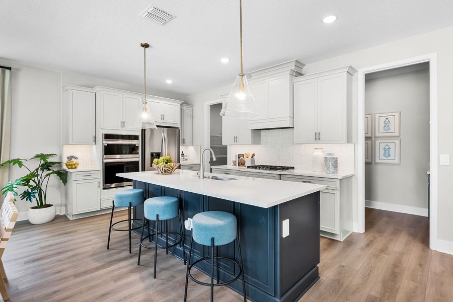 Representative furnished interior of a home built from the Paxton by Hartizen Homes in Eden Crest Single Family Homes, Apopka (Image 11).