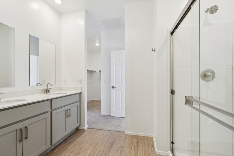 Primary bath. Finishes and options may vary by community.