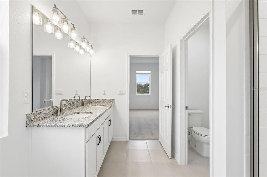 Furnished interior view inside a new home in Eagletail Landings, Howey-in-the-Hills (Image 5).