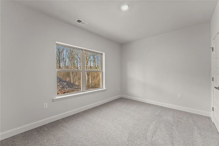 Spacious, unfurnished interior of a new home in Magnolia Villas, Cornelia (Image 21).