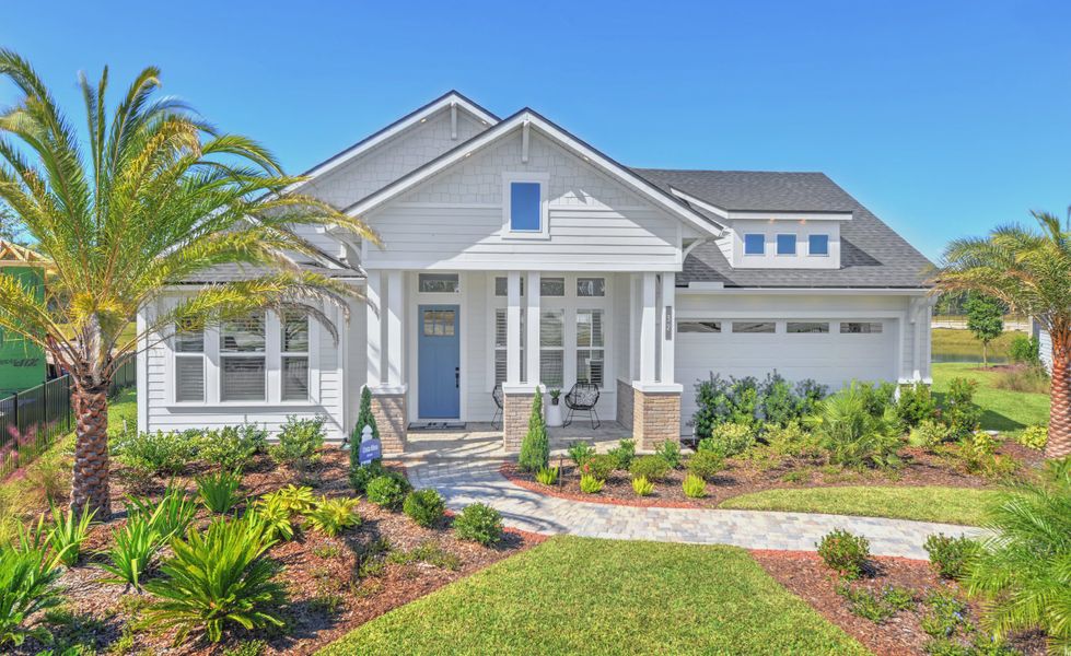 Front exterior of a new home in Courtney Chase, St. Augustine, FL, highlighting curb appeal (Image 2). Front exterior of a new home in Courtney Chase, St. Augustine, FL, highlighting curb appeal (Image 2).