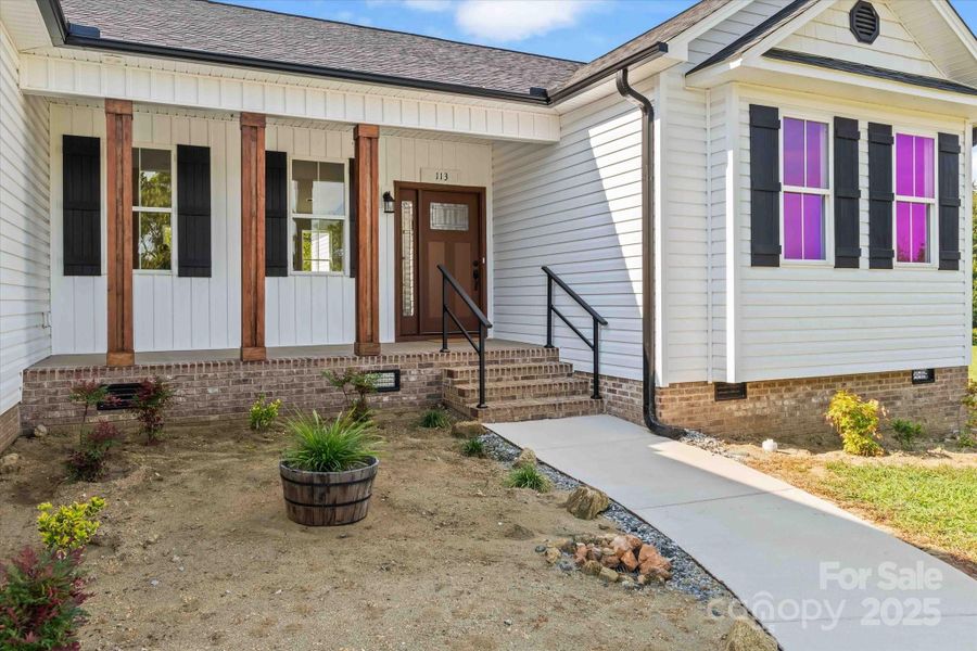 Front exterior of a new home in , Cleveland, NC, highlighting curb appeal (Image 2).