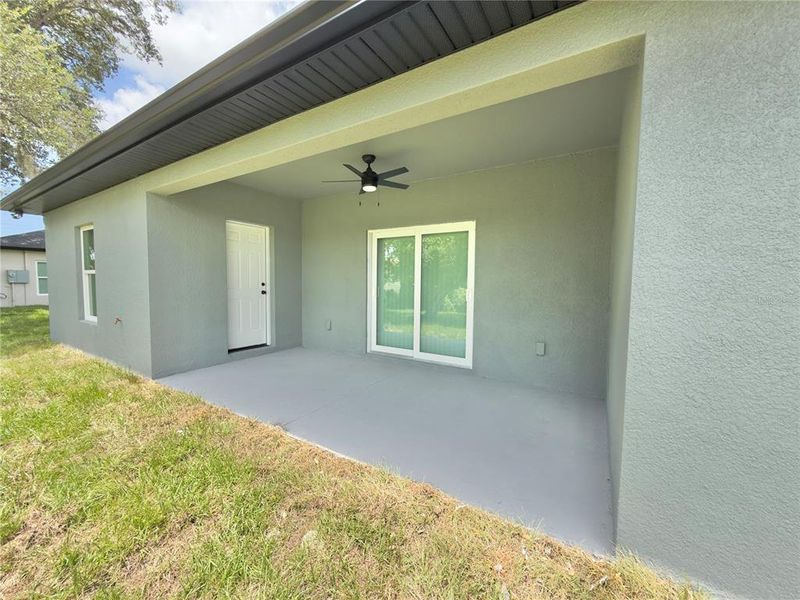 Front exterior of a new home in , Port Charlotte, FL, highlighting curb appeal (Image 26).