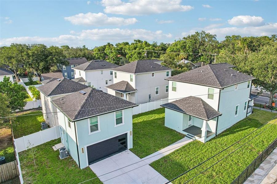 Front exterior of a new home in , Tampa, FL, highlighting curb appeal (Image 24).