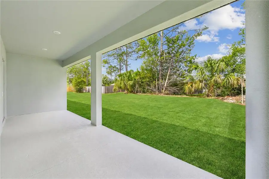 Exterior details and patio area of a home in Palm Coast, Palm Coast (Image 3). Exterior details and patio area of a home in Palm Coast, Palm Coast (Image 3).