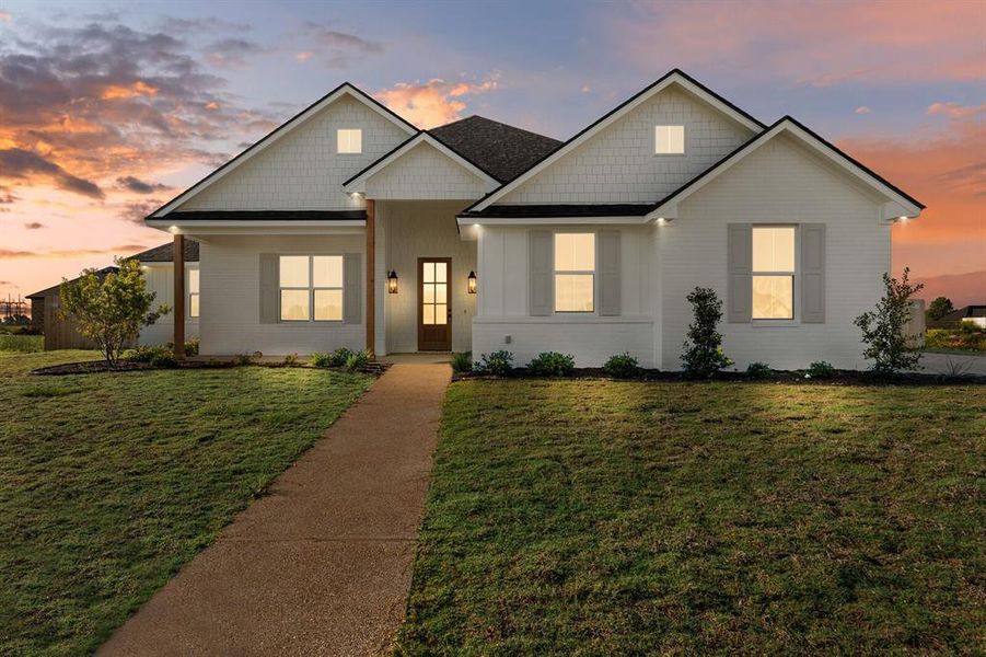 Front exterior of a new home in , Robinson, TX, highlighting curb appeal (Image 25). Front exterior of a new home in , Robinson, TX, highlighting curb appeal (Image 25).