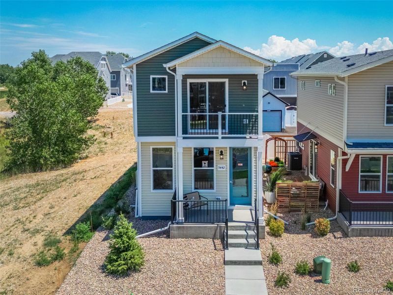 Front exterior of a new home in , Commerce City, CO, highlighting curb appeal (Image 1). Front exterior of a new home in , Commerce City, CO, highlighting curb appeal (Image 1).
