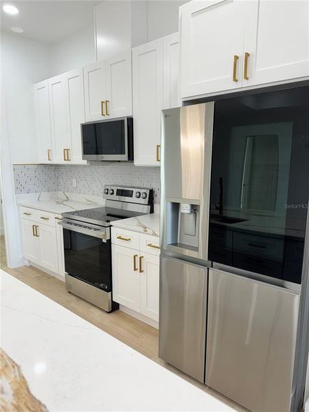 Furnished interior view inside a new home in , Frostproof (Image 8).