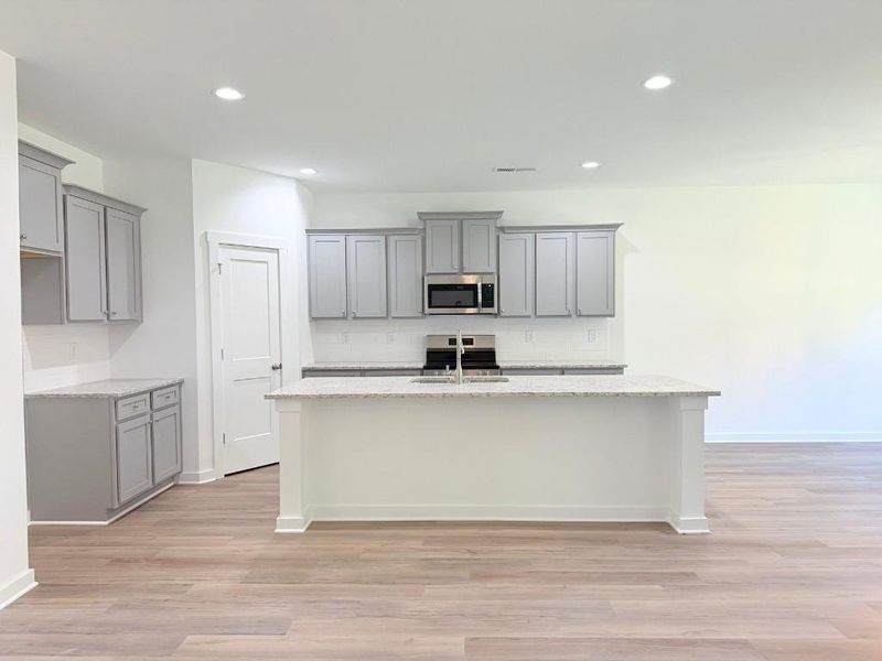 Furnished interior view inside a new home in Westlyn, Winder (Image 11).