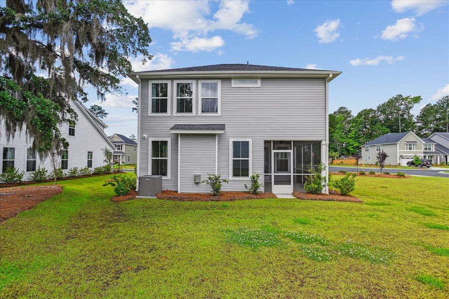 Front exterior of a new home in Windsor Crossing, North Charleston, SC, highlighting curb appeal (Image 22). Front exterior of a new home in Windsor Crossing, North Charleston, SC, highlighting curb appeal (Image 22).