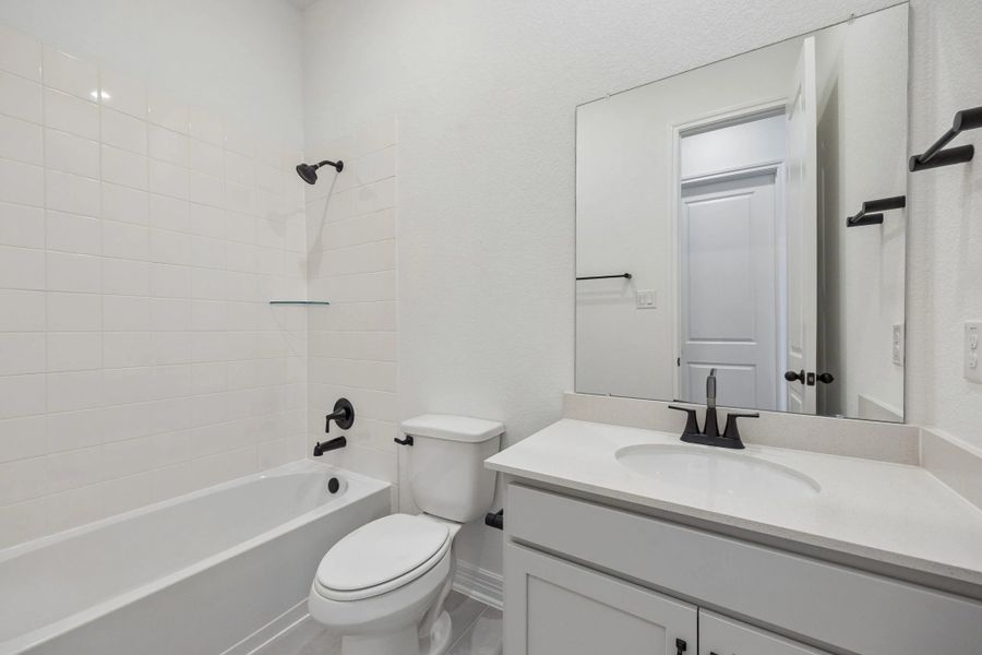 Furnished interior view inside a new home in Bergamo, Katy (Image 11).