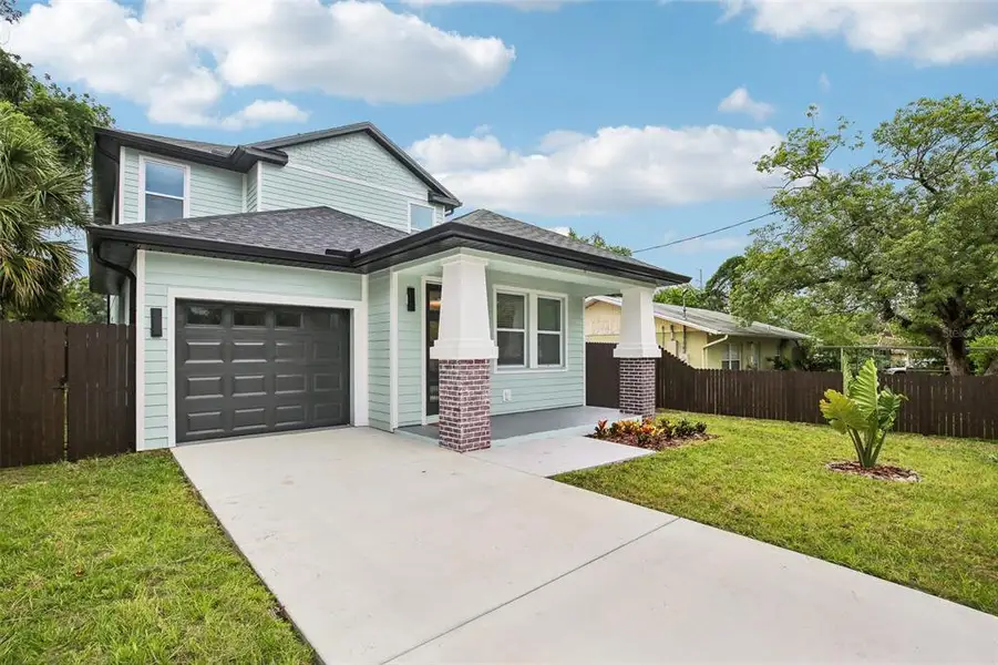 Front exterior of a new home in , Tampa, FL, highlighting curb appeal (Image 2). Front exterior of a new home in , Tampa, FL, highlighting curb appeal (Image 2).