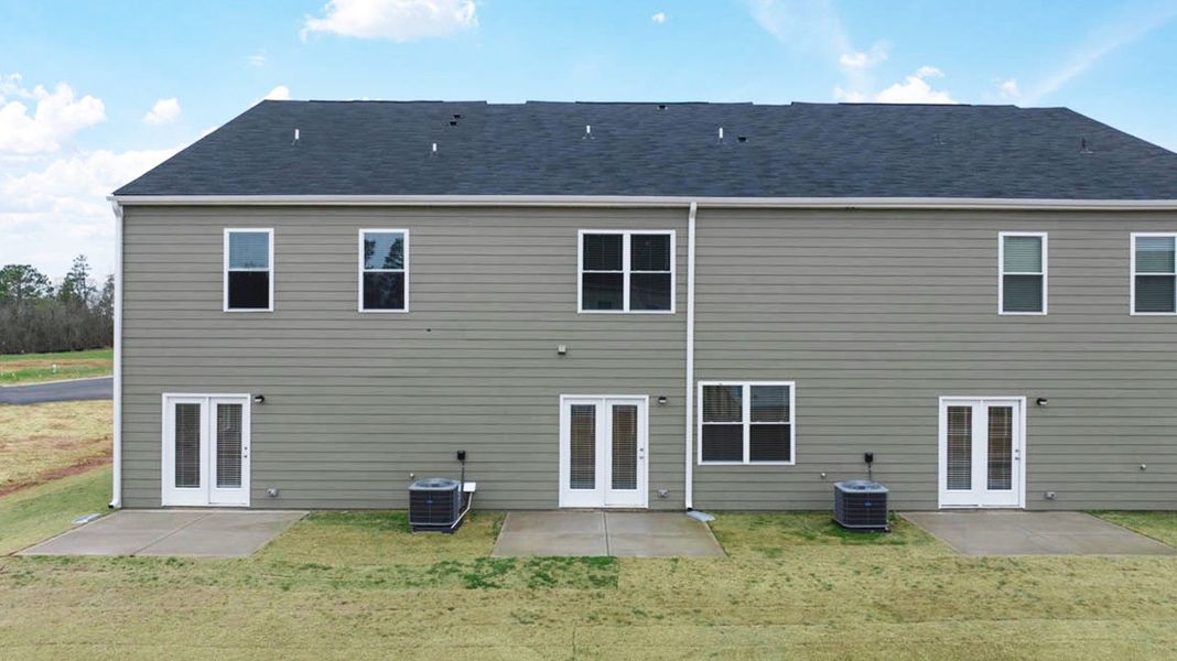 Exterior details and patio area of a home in Laurel Park Townhomes, Hephzibah (Image 3).
