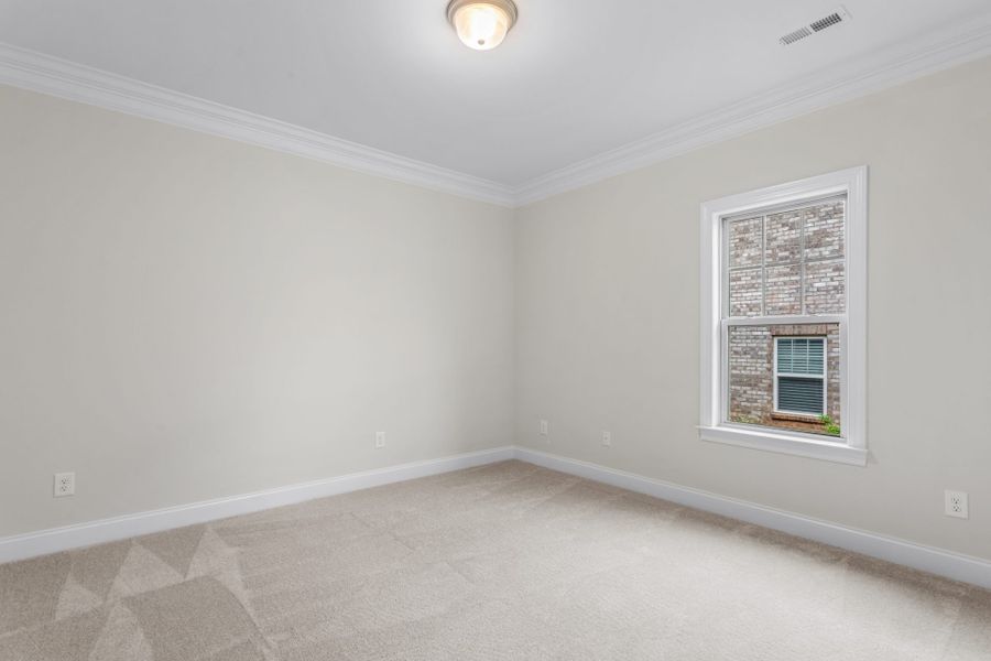 Representative unfurnished interior of a home built from the Ellington by Keystone Homes NC in Weybridge, Burlington (Image 25).