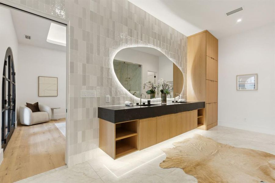 Spacious Bath oasis with designer mirrors and lighting, built-in cabinetry, lighting under cabinetry, duel shower, Hollywood soaking tub, and tile floors Spacious Bath oasis with designer mirrors and lighting, built-in cabinetry, lighting under cabinetry, duel shower, Hollywood soaking tub, and tile floors