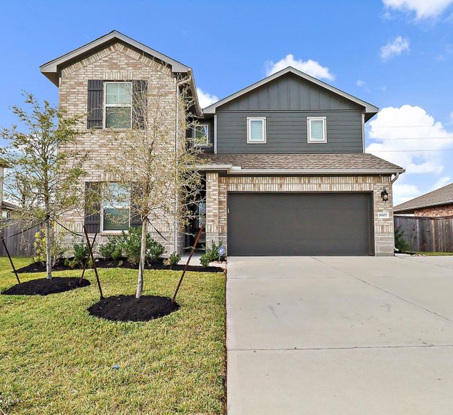 Front exterior of a new home in Heights of Barbers Hill, Baytown, TX, highlighting curb appeal (Image 2).