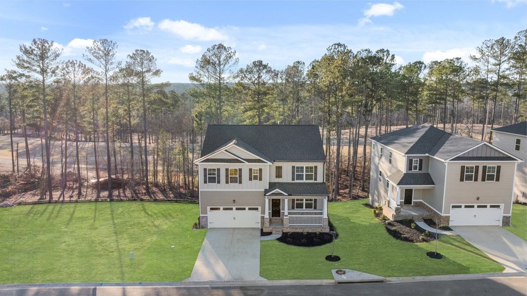 Front exterior of a new home in Southwind Village, Evans, GA, highlighting curb appeal (Image 25).