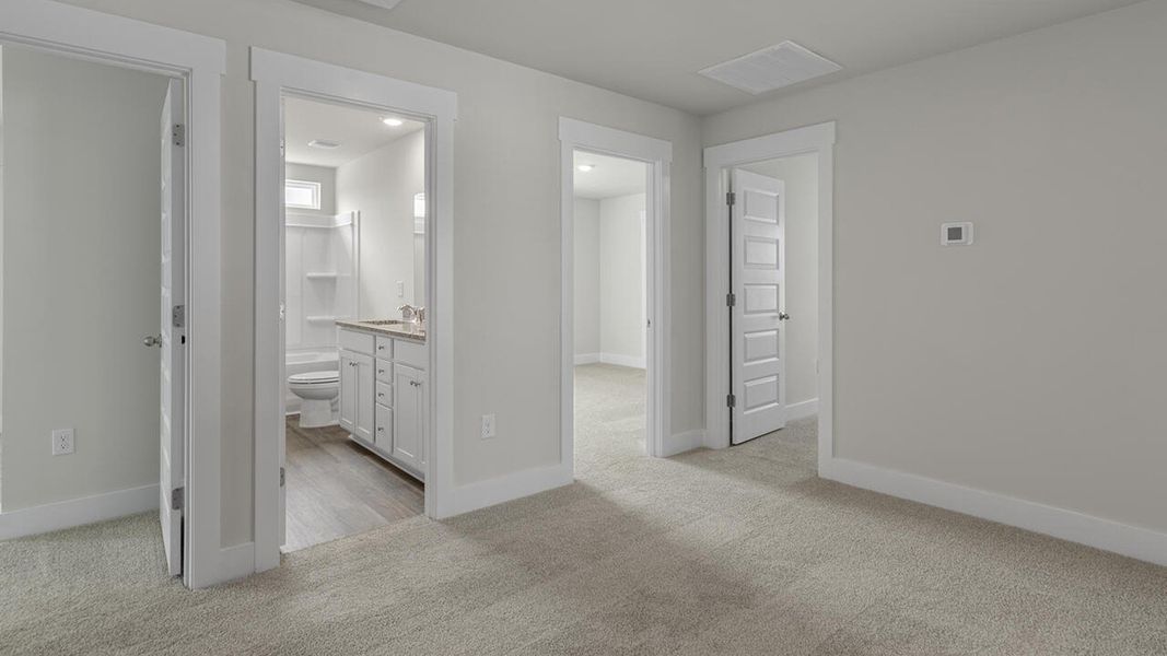 Spacious, unfurnished interior of a new home in Surfside Landing, Hubert (Image 30).